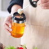 BOTTLE WITH SPOON